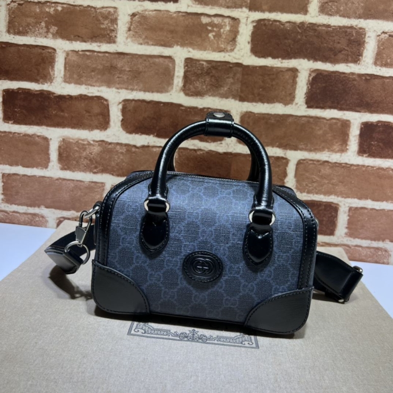 G*u*i top handle bags